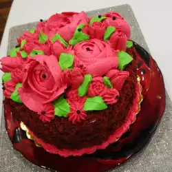 Torta Crveni somot sa cvetovima od švajcarskog krema