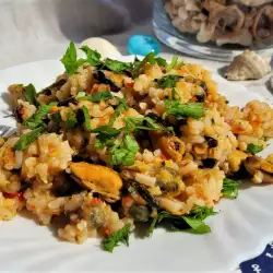 Školjke sa pirinčem i paprikom