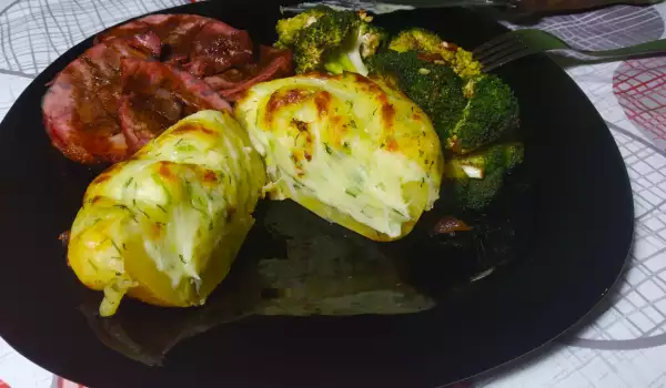 Pečena teleća kolenica sa krompirom i brokolijem